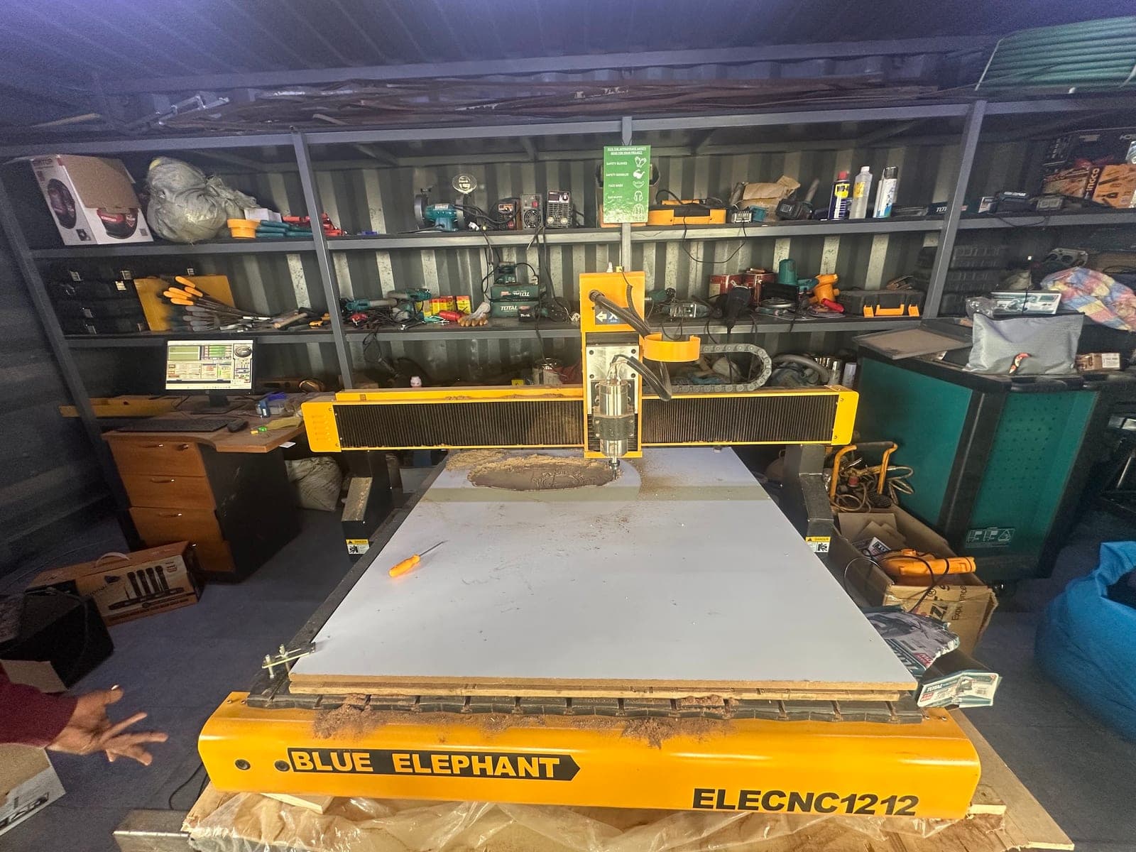 Yellow Blue Elephant ELECNC1212 CNC router inside the workshop container