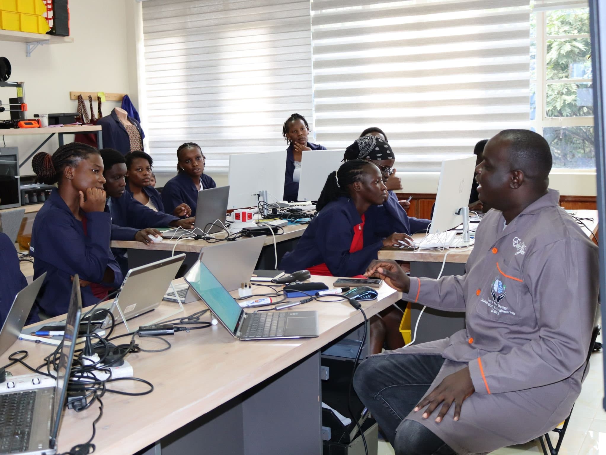 Participants at laptops during a 3D printing training session